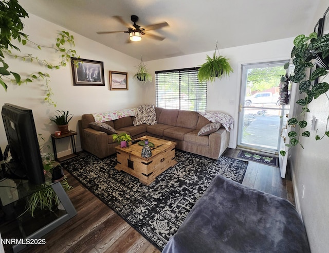 5776 Sculptor Ct, Sun Valley, NV 89433 - living area featuring lofted ceiling, wood finished floors, ceiling fan, and healthy amount of natural light