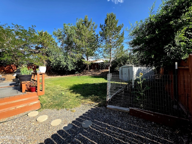 5776 Sculptor Ct, Sun Valley, NV 89433 - fenced backyard featuring a storage unit