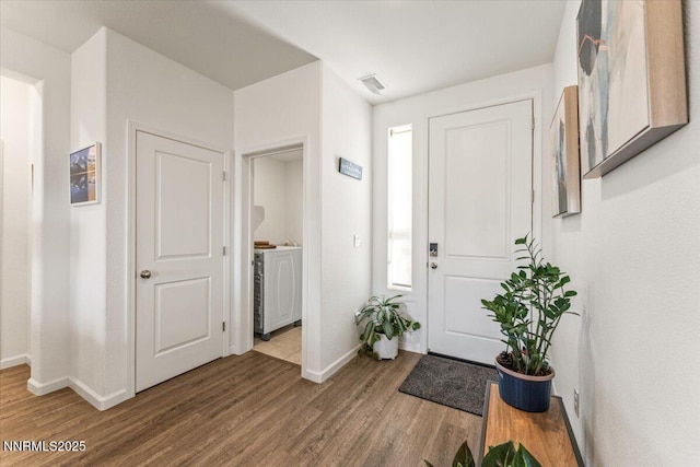 516 Beckwourth Dr, Reno, NV 89506 - foyer entrance with baseboards and wood finished floors