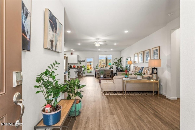 516 Beckwourth Dr, Reno, NV 89506 - living room with wood finished floors, ceiling fan, and recessed lighting