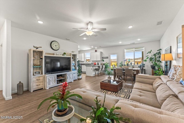 516 Beckwourth Dr, Reno, NV 89506 - living area featuring ceiling fan, wood finished floors, and recessed lighting