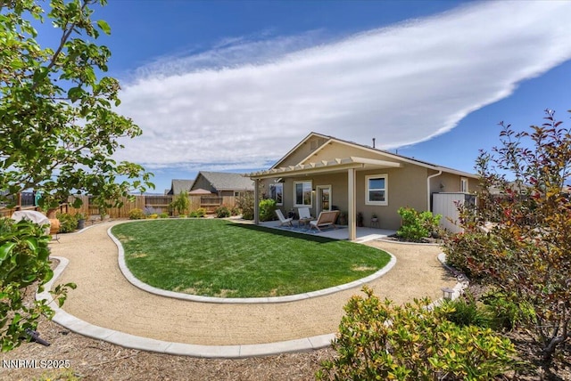 516 Beckwourth Dr, Reno, NV 89506 - back of house with a fenced backyard, a patio area, and stucco siding
