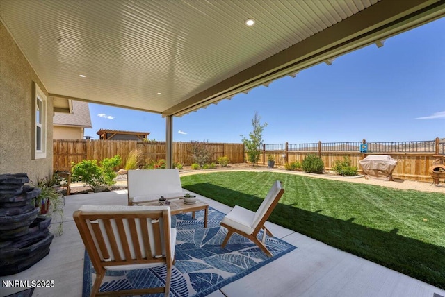 516 Beckwourth Dr, Reno, NV 89506 - fenced backyard featuring a patio area and an outdoor living space
