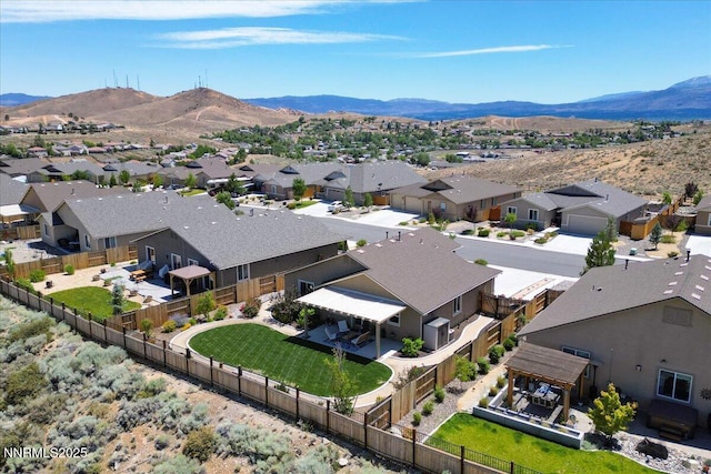 516 Beckwourth Dr, Reno, NV 89506 - aerial perspective of suburban area featuring a mountainous background