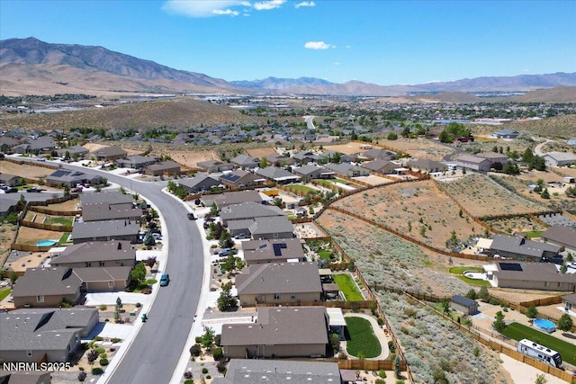 516 Beckwourth Dr, Reno, NV 89506 - aerial overview of property's location with nearby suburban area and mountains