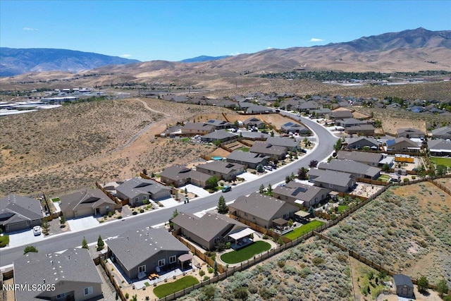 516 Beckwourth Dr, Reno, NV 89506 - aerial view of property and surrounding area with a mountainous background and nearby suburban area
