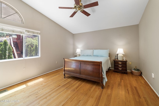 3280 Thornhill Dr, Reno, NV 89509 - bedroom with vaulted ceiling, light wood-style floors, and ceiling fan