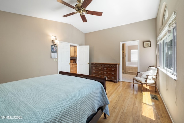 3280 Thornhill Dr, Reno, NV 89509 - bedroom featuring light wood-style floors, lofted ceiling, connected bathroom, and a ceiling fan