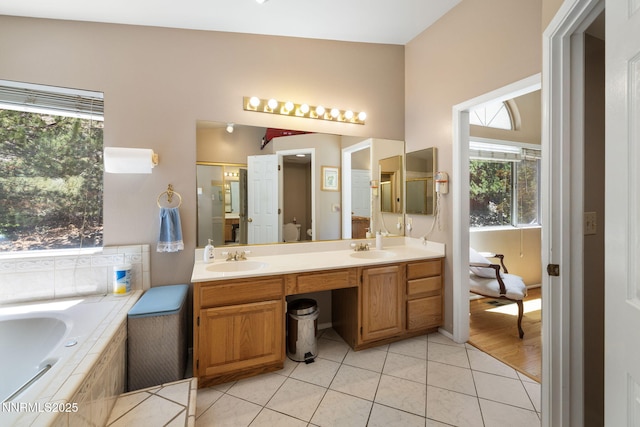 3280 Thornhill Dr, Reno, NV 89509 - bathroom with double vanity, a garden tub, and tile patterned flooring