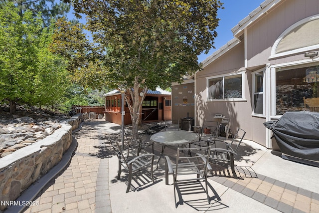 3280 Thornhill Dr, Reno, NV 89509 - view of patio featuring grilling area and outdoor dining area