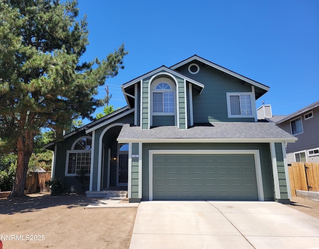 2967 Aspendale Dr, Reno, NV 89503 - view of front of home with a garage, driveway, and a shingled roof