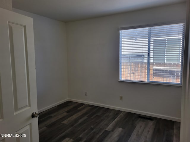 2967 Aspendale Dr, Reno, NV 89503 - spare room featuring dark wood finished floors and baseboards