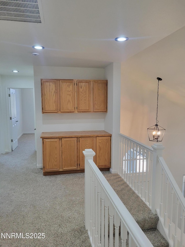 2967 Aspendale Dr, Reno, NV 89503 - hall with recessed lighting, a chandelier, healthy amount of natural light, and an upstairs landing