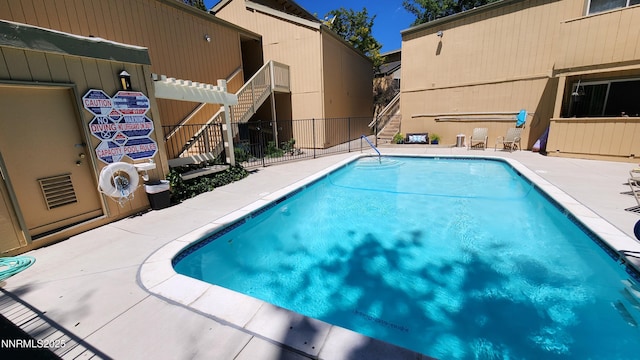 2300 Dickerson Rd Unit 16, Reno, NV 89503 - community pool featuring stairs and a patio area