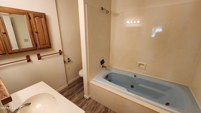 2300 Dickerson Rd Unit 16, Reno, NV 89503 - bathroom with wood finished floors, a combined bath / shower with jetted tub, and vanity
