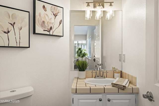 4030 Willowsprings Dr, Reno, NV 89519 - bathroom featuring vanity and a chandelier