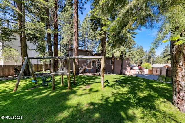 173 Hall Ct, Stateline, NV 89449 - fenced backyard featuring a playground