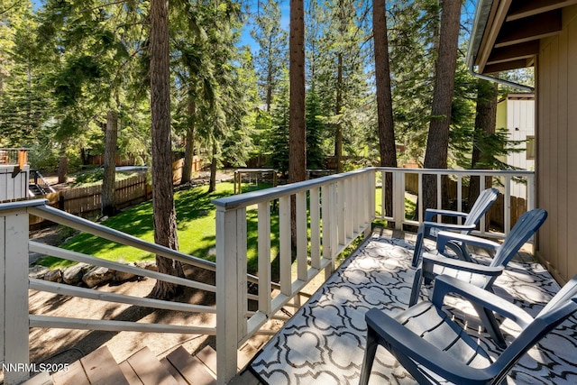 173 Hall Ct, Stateline, NV 89449 - view of wooden balcony with a wooden deck and view of scattered trees