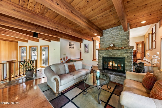 173 Hall Ct, Stateline, NV 89449 - living room featuring wood finished floors, a stone fireplace, recessed lighting, and a wood ceiling with exposed beams