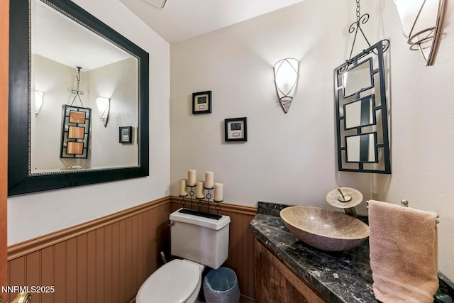 173 Hall Ct, Stateline, NV 89449 - half bathroom featuring wainscoting and vanity