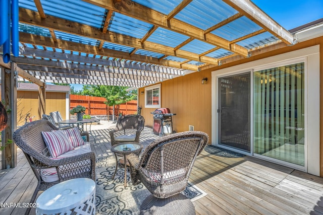 6670 Lotus St, Reno, NV 89506 - wooden terrace with a fenced backyard, a pergola, and grilling area