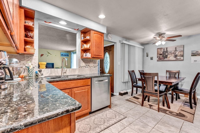 6670 Lotus St, Reno, NV 89506 - kitchen featuring open shelves, stainless steel dishwasher, decorative backsplash, brown cabinetry, and a textured ceiling