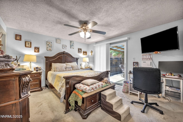 6670 Lotus St, Reno, NV 89506 - bedroom with access to outside, light colored carpet, an office area, ceiling fan, and a textured ceiling