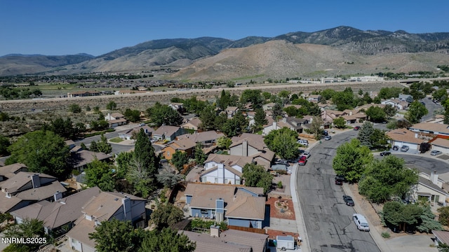 777 W Bonanza Dr, Carson City, NV 89706 - aerial overview of property's location featuring nearby suburban area and a mountainous background
