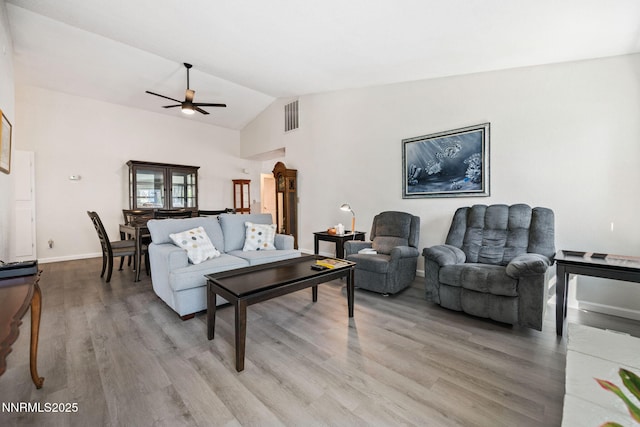 777 W Bonanza Dr, Carson City, NV 89706 - living area featuring ceiling fan, vaulted ceiling, and light wood-type flooring