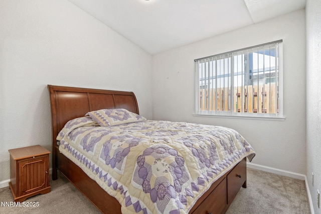 777 W Bonanza Dr, Carson City, NV 89706 - carpeted bedroom featuring baseboards and vaulted ceiling