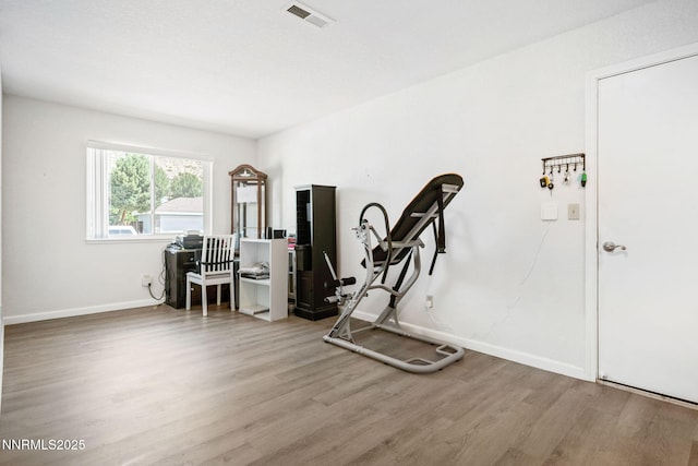 777 W Bonanza Dr, Carson City, NV 89706 - exercise room with wood finished floors and baseboards