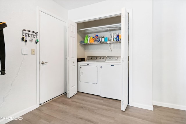 777 W Bonanza Dr, Carson City, NV 89706 - laundry room with separate washer and dryer and light wood-type flooring