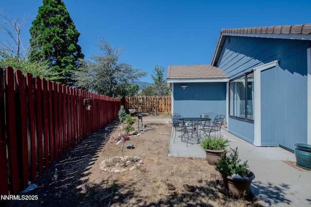 777 W Bonanza Dr, Carson City, NV 89706 - fenced backyard with a patio