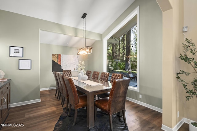 210 Allen Way, Incline Village, NV 89451 - dining room with dark wood-style floors, arched walkways, vaulted ceiling, and a chandelier