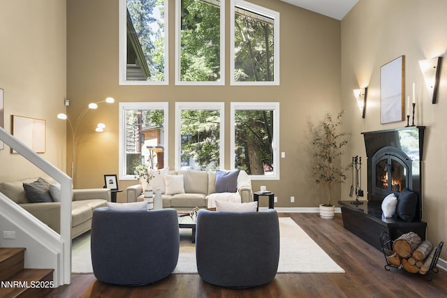 210 Allen Way, Incline Village, NV 89451 - living room with a high ceiling, plenty of natural light, stairway, and a glass covered fireplace