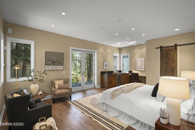 210 Allen Way, Incline Village, NV 89451 - bedroom with access to outside, a barn door, light wood-type flooring, and recessed lighting