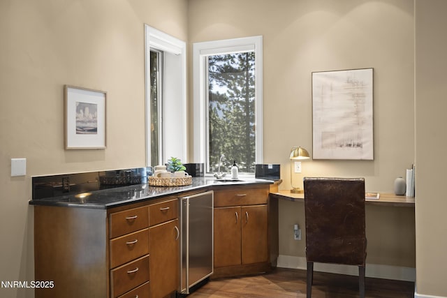 210 Allen Way, Incline Village, NV 89451 - kitchen featuring fridge, plenty of natural light, wood finished floors, and brown cabinets