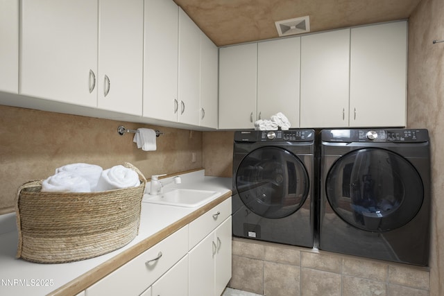 210 Allen Way, Incline Village, NV 89451 - laundry area with cabinet space and washing machine and dryer