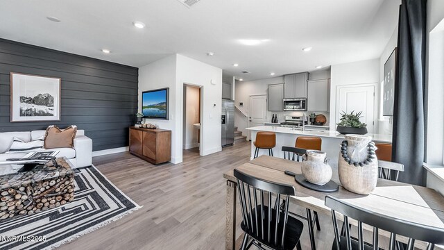 1639 Prancer St Lot # 47, Reno, NV 89523 - kitchen featuring stainless steel appliances, light countertops, gray cabinetry, light wood-style floors, and recessed lighting