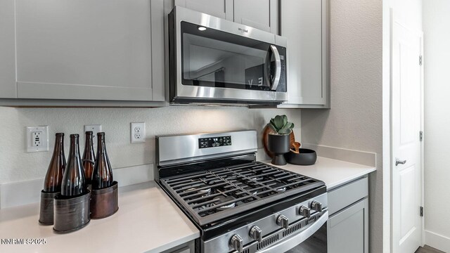 1639 Prancer St Lot # 47, Reno, NV 89523 - kitchen featuring appliances with stainless steel finishes, light countertops, and gray cabinetry