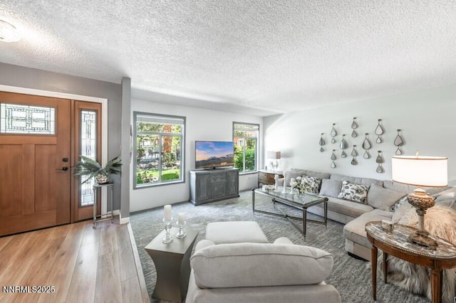 1419 Foster Dr, Reno, NV 89509 - living area with wood finished floors and a textured ceiling