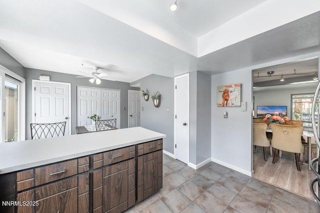 1419 Foster Dr, Reno, NV 89509 - kitchen featuring ceiling fan, light countertops, and track lighting