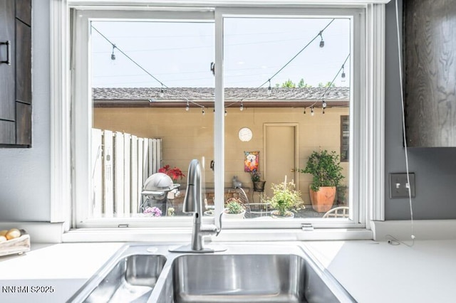 1419 Foster Dr, Reno, NV 89509 - kitchen view of a sink and light countertops