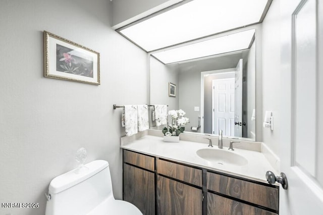 1419 Foster Dr, Reno, NV 89509 - half bathroom featuring toilet and vanity