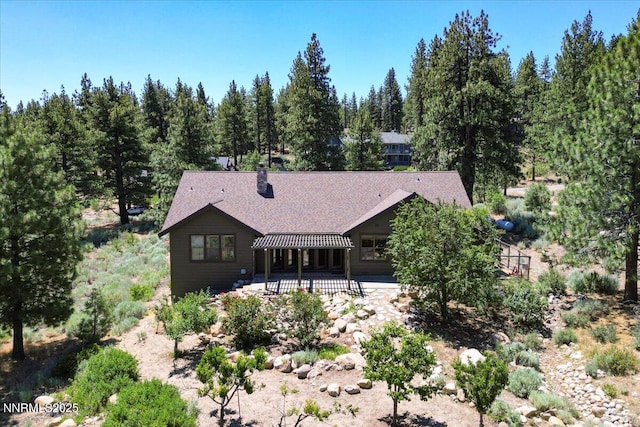 6195 Philoree Ln, Reno, NV 89511 - rear view of property with a patio area and a chimney