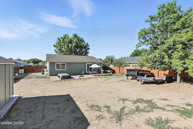 5863 Foggy Ct, Sun Valley, NV 89433 - fenced backyard featuring a patio area