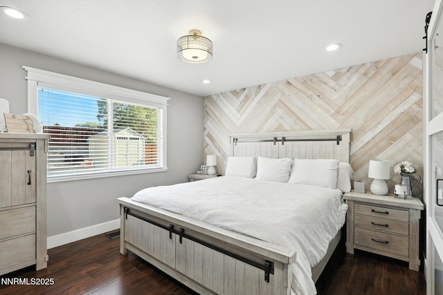 5863 Foggy Ct, Sun Valley, NV 89433 - bedroom featuring recessed lighting and dark wood-type flooring