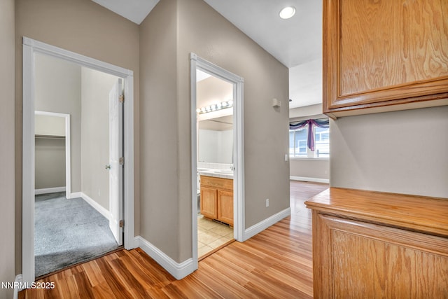 7449 Ambush Cir, Sparks, NV 89436 - hallway featuring light wood finished floors and recessed lighting