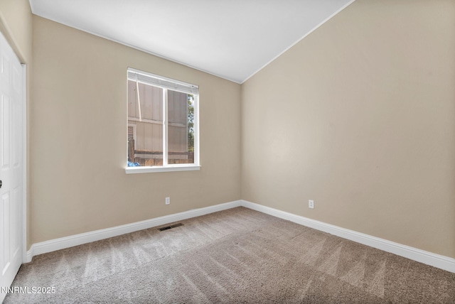 7449 Ambush Cir, Sparks, NV 89436 - spare room with carpet and lofted ceiling