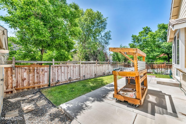 7449 Ambush Cir, Sparks, NV 89436 - fenced backyard with a patio area